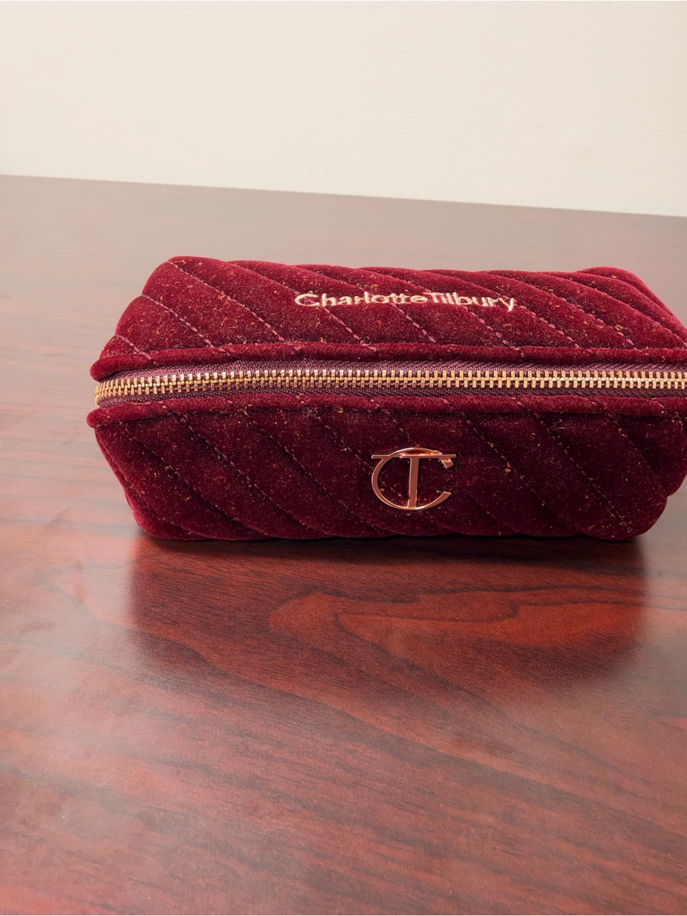 Charlotte Tilbury Wine Red Quilted Velvet Cosmetic Case with Gold Hardware